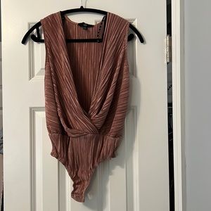 Plisse bodysuit thong. No tags but never worn.